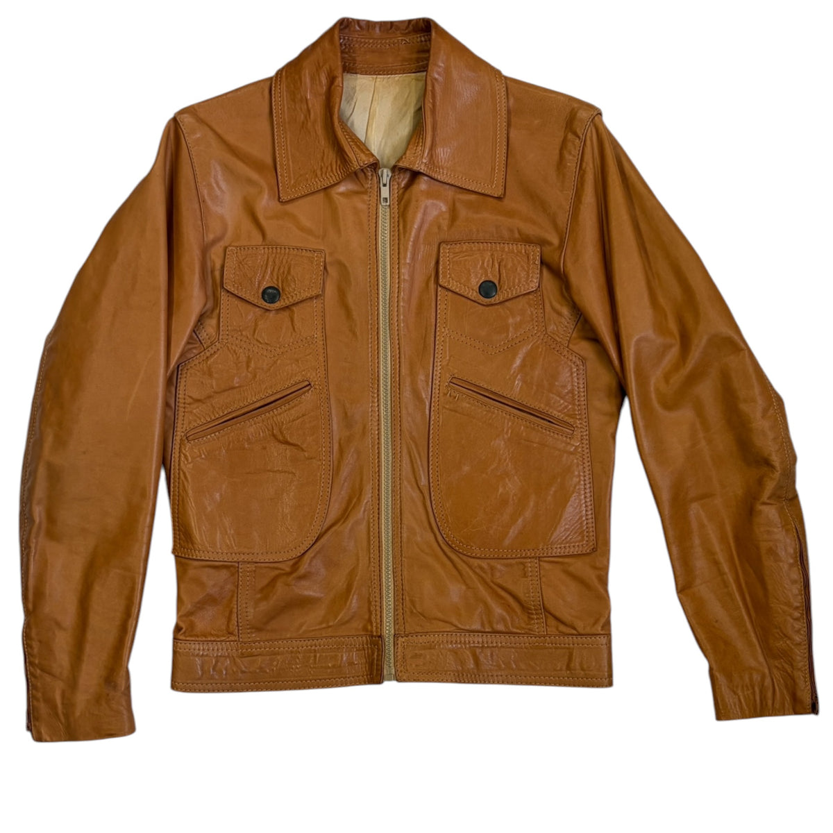 cognac leather jacket with zip front, utility pockets, and fitted silhouette