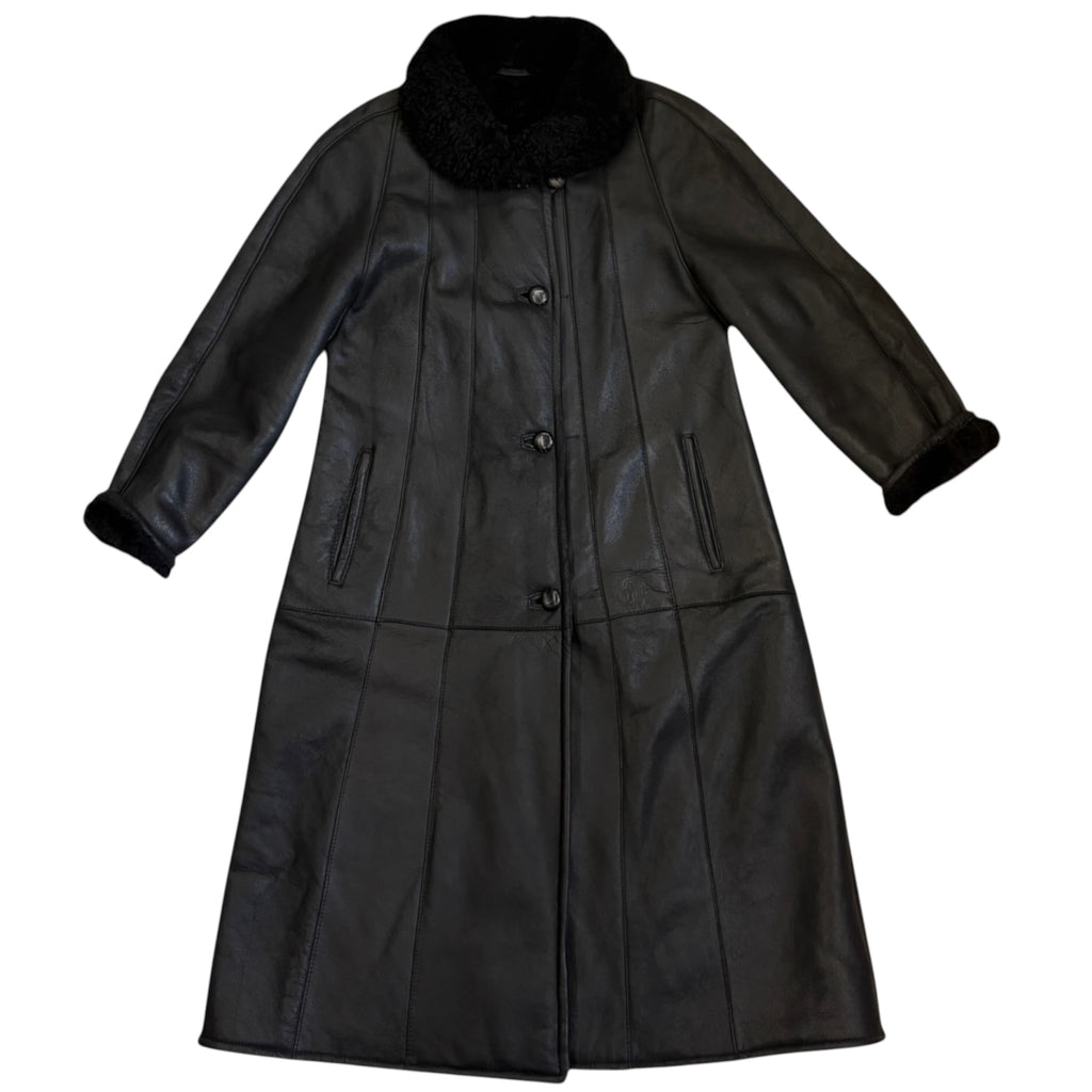 black coat, sheepskin leather exterior with shearling lining