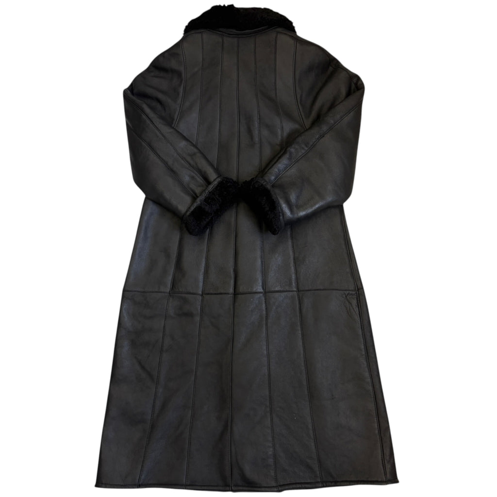 black coat, sheepskin leather exterior with shearling lining back