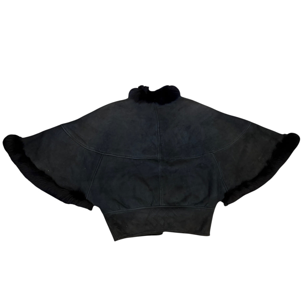black sheepskin cape coat back