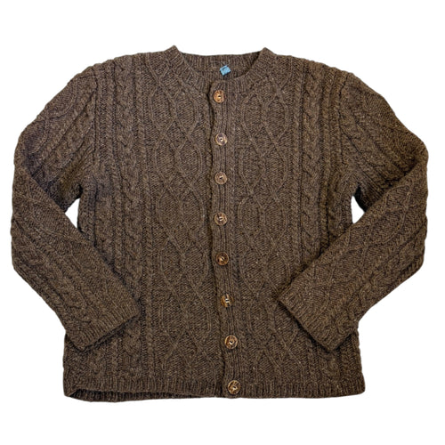 brown cable-knit cardigan with traditional Aran-style patterning and wood-look buttons