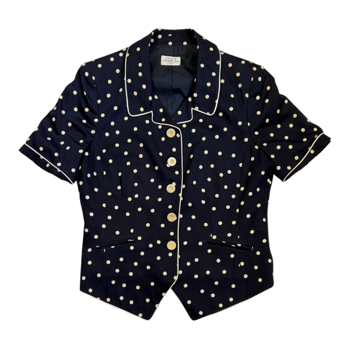 dark blue polka dot blouse
