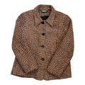 red and white bouclé jacket