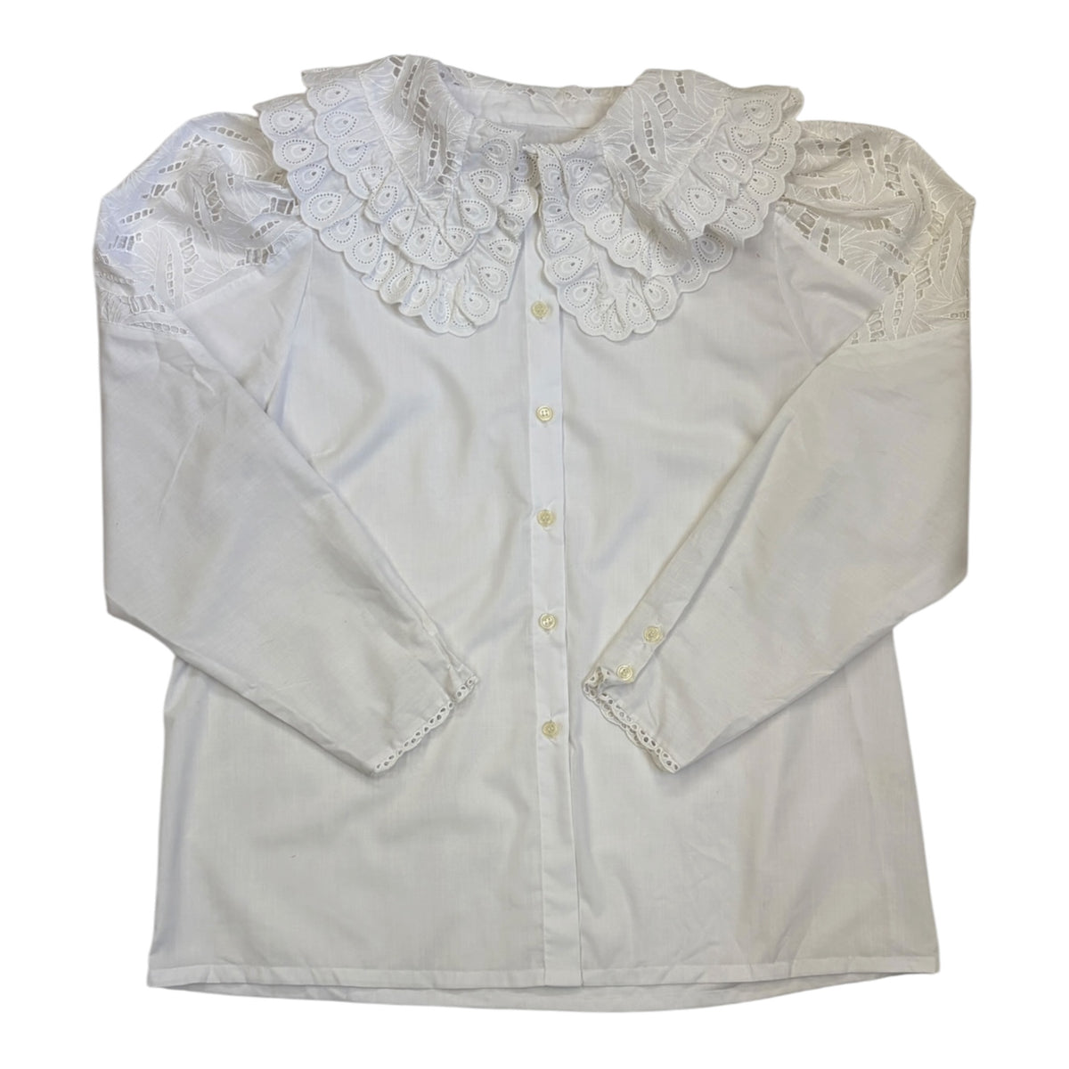 white blouse with oversized embroidered lace collar
